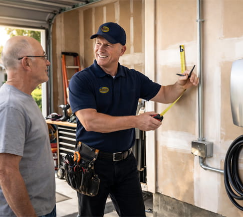 Licensed electrician discussing residential electrical work